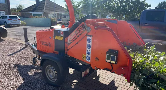 Professional wood chipper on site in North Norfolk
